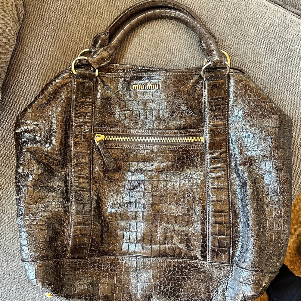 Miu Miu bag - loved it, but it is honestly just not using it anymore.